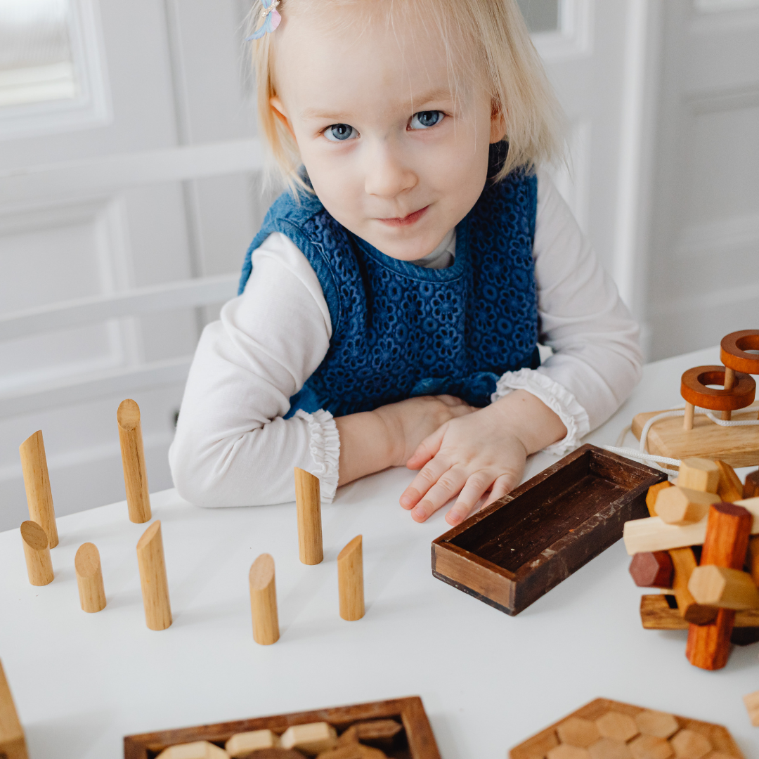 Child working on Montessori practical life activities