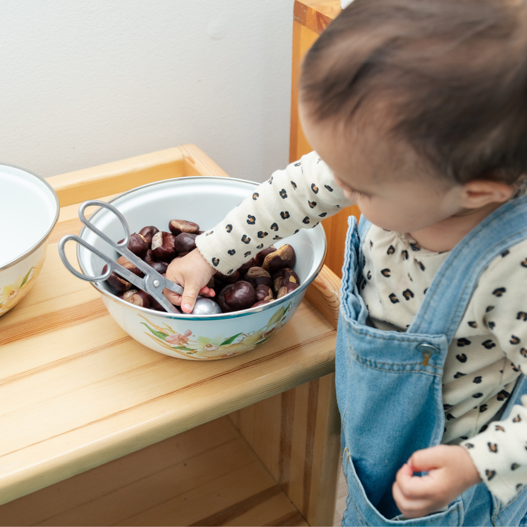 Toddler working independently in a Montessori environment