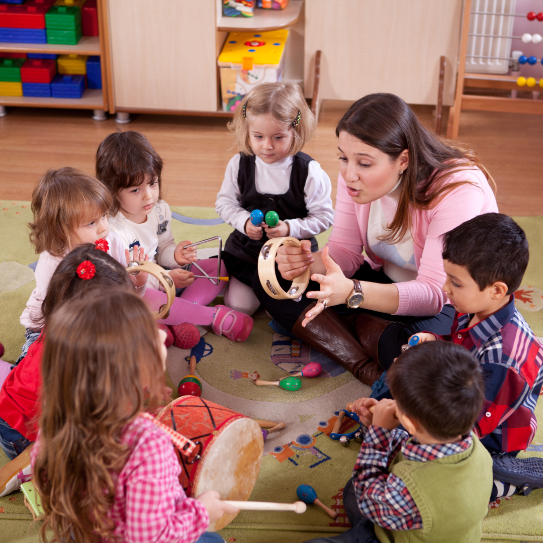 Children engaged in Montessori learning activities at Oak Grove